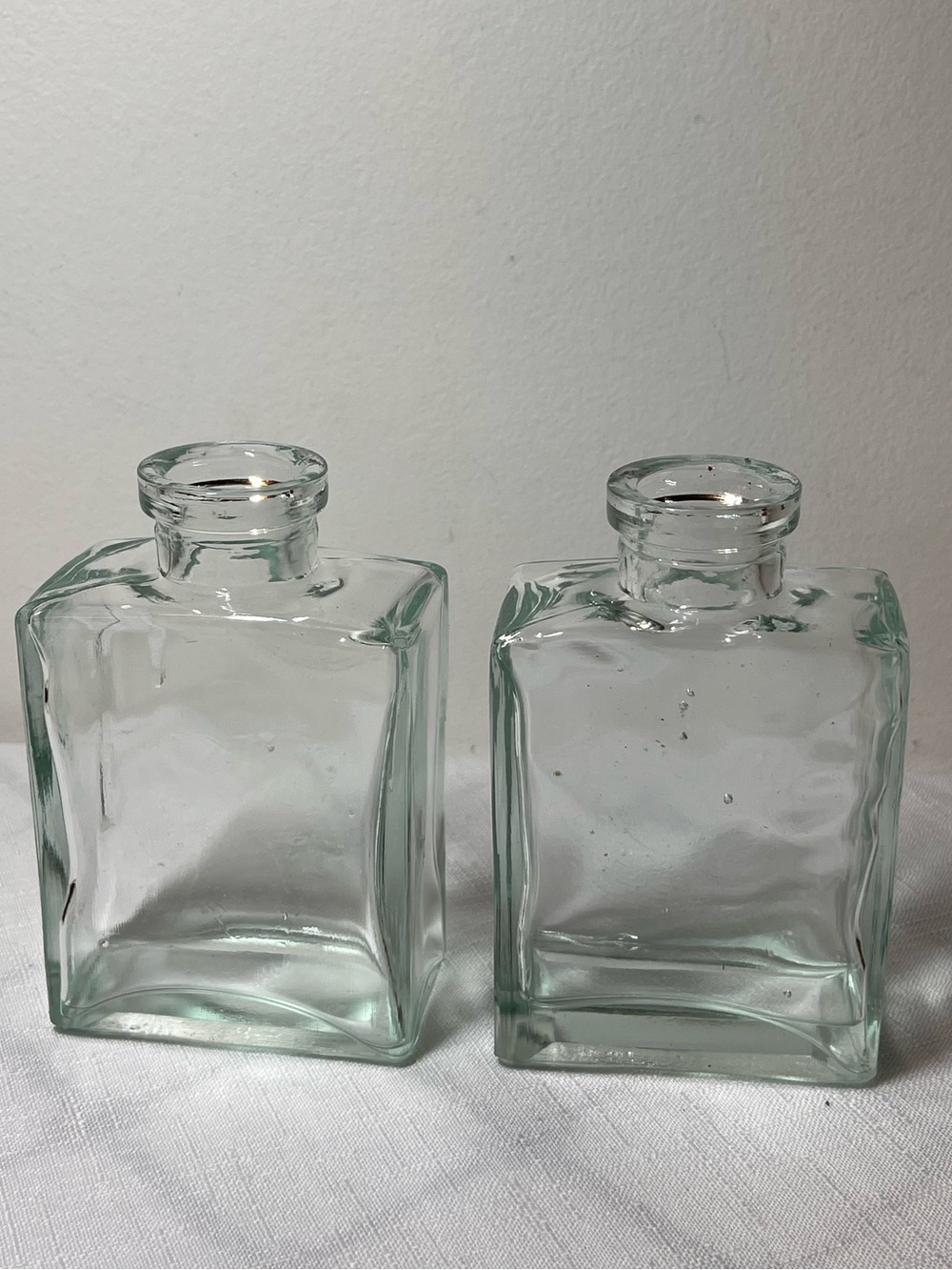 vintage-style rectangular glass bottles 
apothecary prop bud vase decorative jar